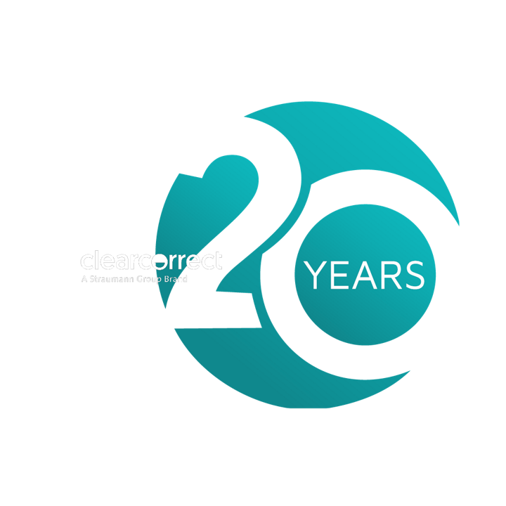 Clear aligners, laptop and mobile phone. 