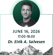 picture of a man, mountains in background and grey text