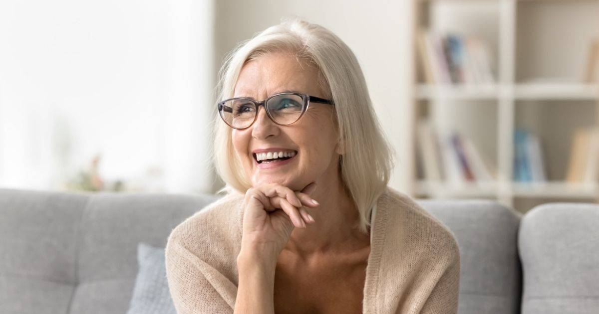 Lady with All on 6 implants smiling