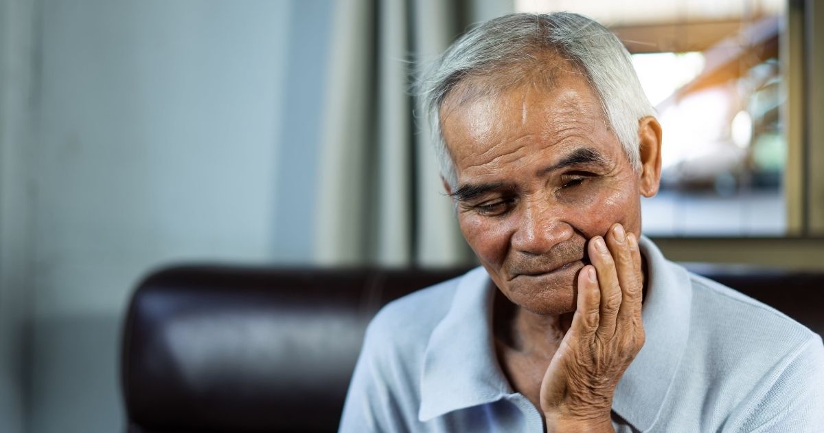 a patient checking the dental implant costs in the UK