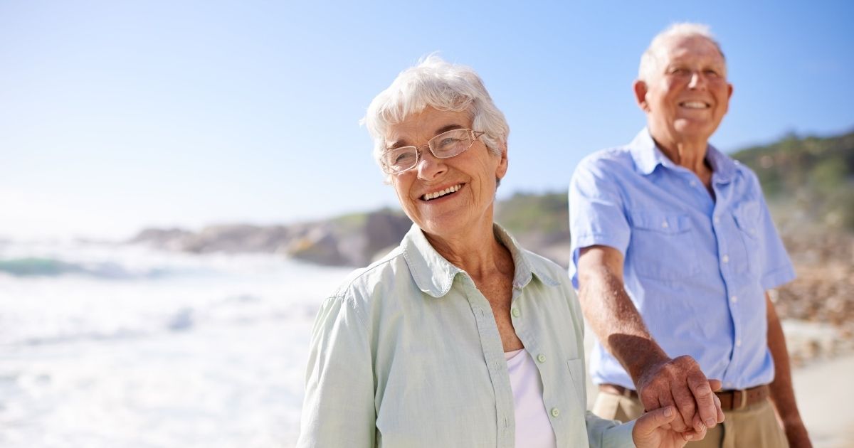 couple with full mouth dental implants